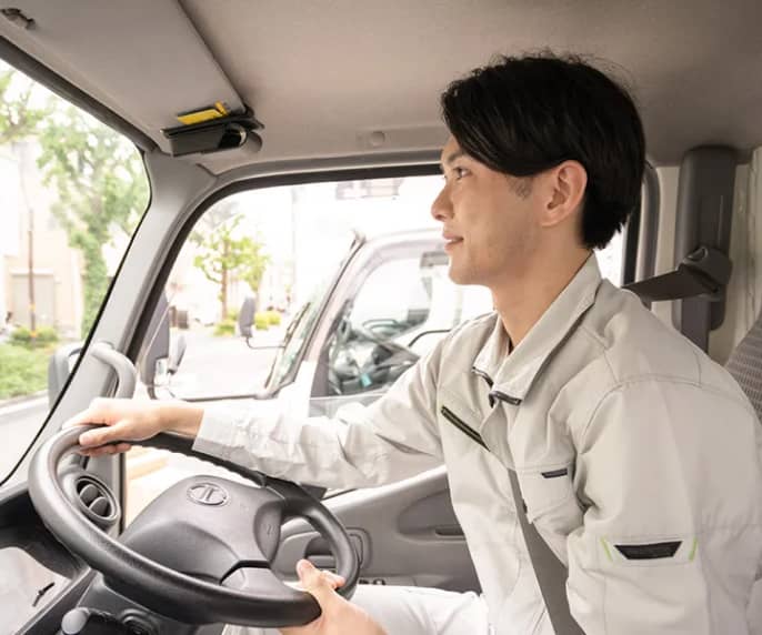 運転中で手が離せないドライバーとのコミュニケーションに